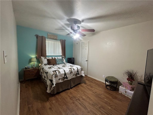 1645 W Manor Dr W, Corpus Christi, TX 78412 - bedroom with wood finished floors and a ceiling fan