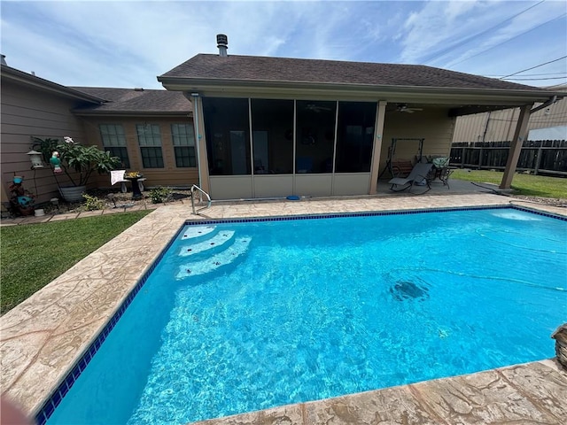 1645 W Manor Dr W, Corpus Christi, TX 78412 - view of swimming pool featuring a patio area, ceiling fan, and a sunroom