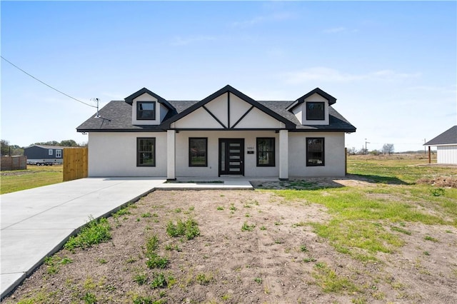 view of front of house featuring stucco siding