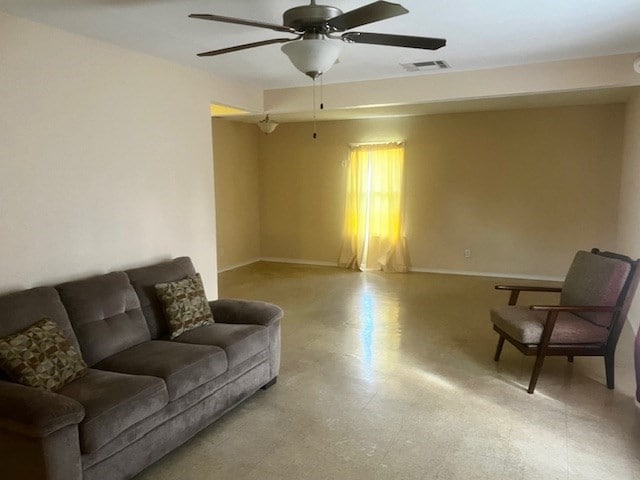 502 S Stephenson St, Beeville, TX 78102 - living area featuring a ceiling fan and tile patterned floors