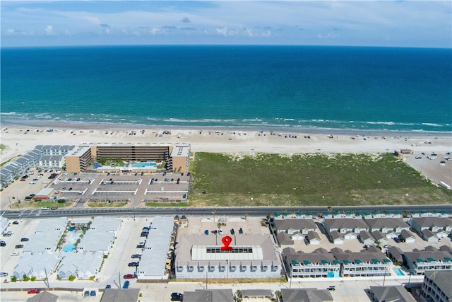 bird's eye view with a beach view and a water view