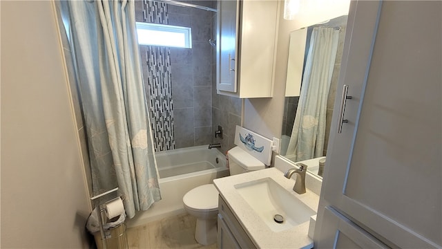 full bathroom featuring vanity, toilet, and shower / bath combination with curtain