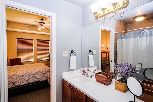 bathroom featuring vanity, a shower with shower curtain, and ceiling fan