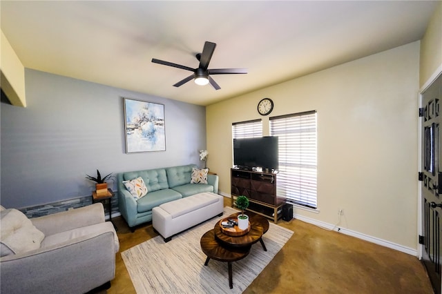 living room featuring ceiling fan