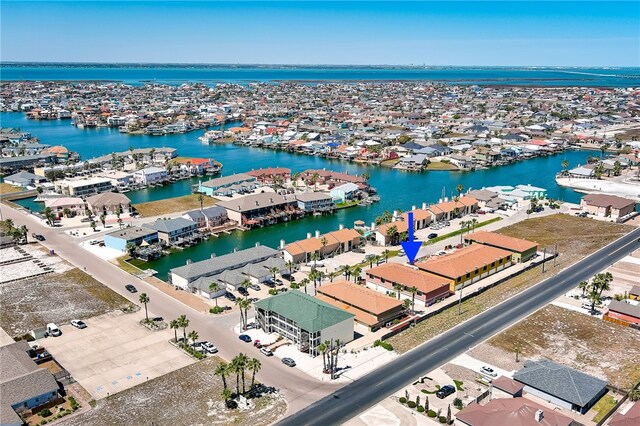 birds eye view of property featuring a water view