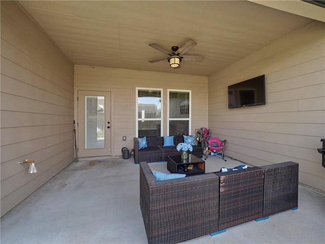 view of patio featuring ceiling fan and an outdoor living space