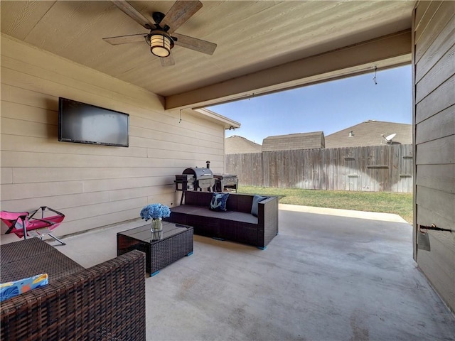 view of patio / terrace featuring ceiling fan, fence, and an outdoor hangout area