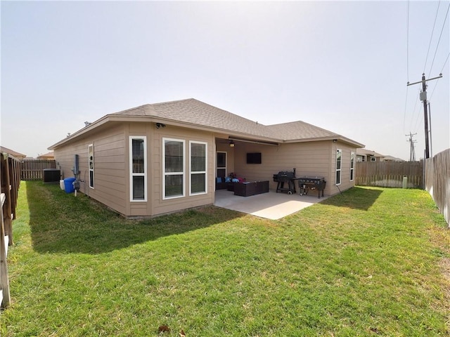 rear view of house featuring a patio, central AC, a fenced backyard, and a ceiling fan