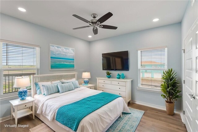 113 Knickerbocker St, Corpus Christi, TX 78418 - bedroom with wood finished floors, baseboards, recessed lighting, and a ceiling fan