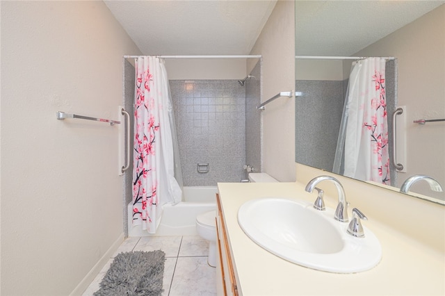 full bathroom with shower / bath combo, toilet, tile patterned floors, a textured ceiling, and vanity