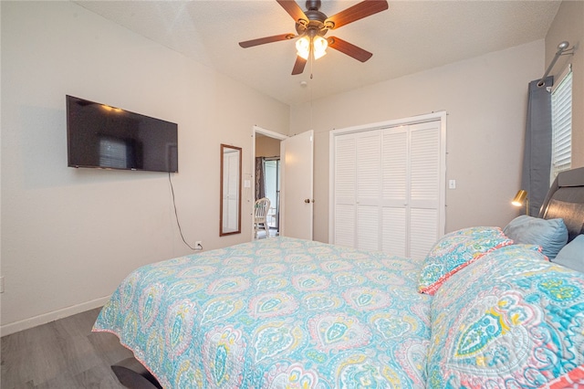 bedroom featuring hardwood / wood-style floors and ceiling fan