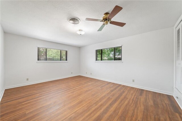 445 Poenisch, Corpus Christi, TX 78412 - unfurnished room featuring healthy amount of natural light, wood finished floors, and baseboards
