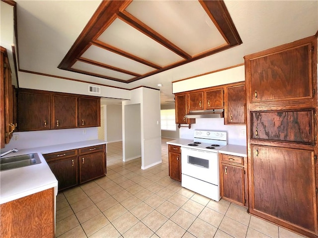 kitchen with electric stove, light tile patterned flooring, and sink