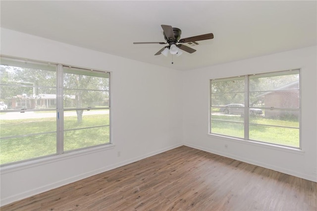 704 E Henderson St, Bishop, TX 78343 - spare room featuring wood finished floors and ceiling fan