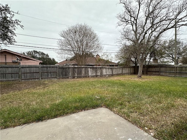 6118 Locke, Corpus Christi, TX 78415 - fenced backyard featuring a patio