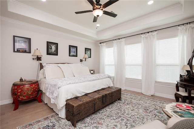 4101 Karo Dr, Corpus Christi, TX 78414 - bedroom with a tray ceiling, crown molding, wood finished floors, ceiling fan, and recessed lighting