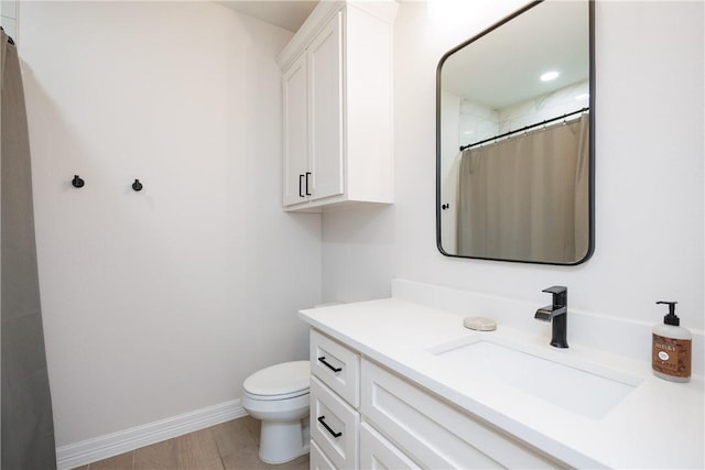 4101 Karo Dr, Corpus Christi, TX 78414 - full bathroom featuring vanity, curtained shower, and wood finished floors