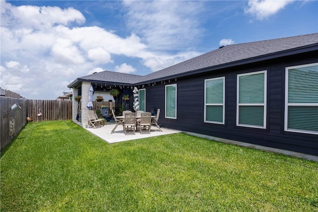 4101 Karo Dr, Corpus Christi, TX 78414 - rear view of house featuring a fenced backyard, a patio area, and a shingled roof
