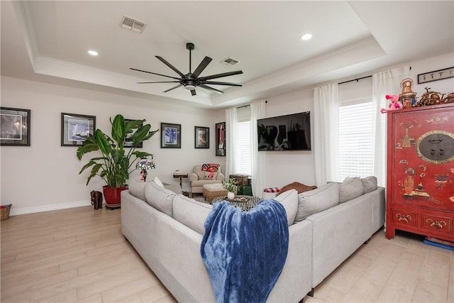 4101 Karo Dr, Corpus Christi, TX 78414 - living area with a raised ceiling, a ceiling fan, recessed lighting, light wood-style flooring, and ornamental molding