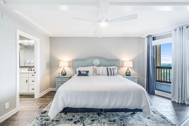 bedroom featuring a ceiling fan, access to exterior, wood finished floors, baseboards, and ensuite bath