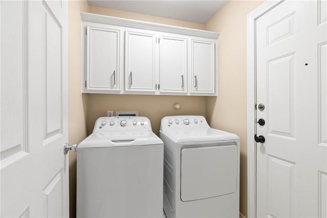 3837 Brockhampton Ct, Corpus Christi, TX 78414 - laundry room with cabinet space and washing machine and clothes dryer