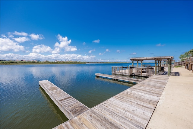 view of dock with a water view