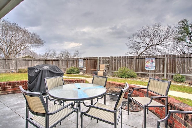 view of patio with a grill