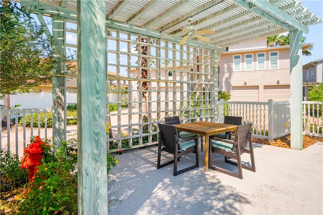 view of patio featuring ceiling fan and a pergola