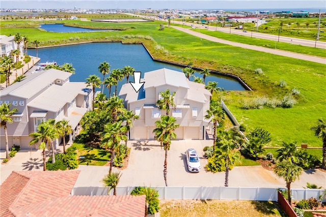 birds eye view of property featuring a water view