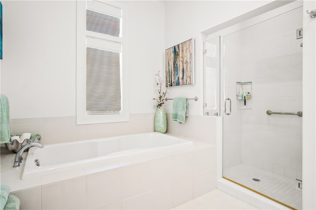 bathroom with independent shower and bath