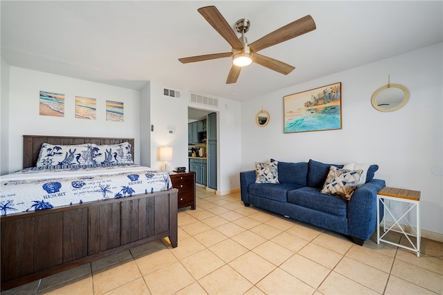 tiled bedroom featuring ceiling fan