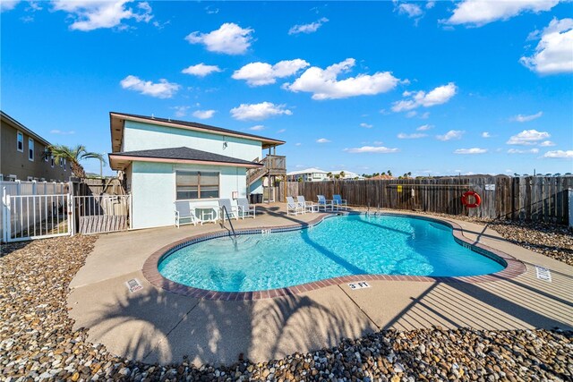 view of pool featuring a patio area