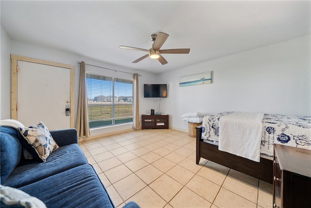 tiled bedroom with ceiling fan