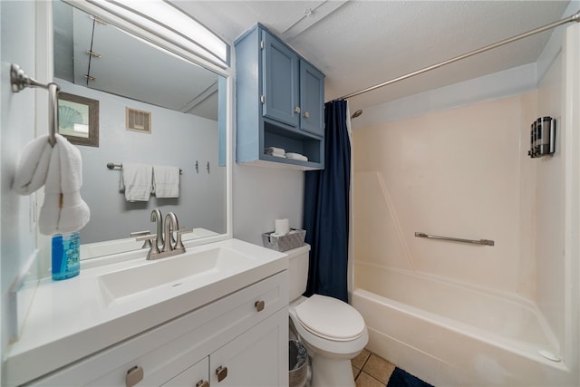 full bathroom featuring toilet, vanity, tile patterned floors, and shower / tub combo with curtain