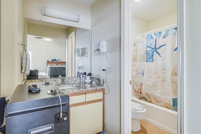 full bathroom with toilet, vanity, shower / bath combination with curtain, and tile patterned floors