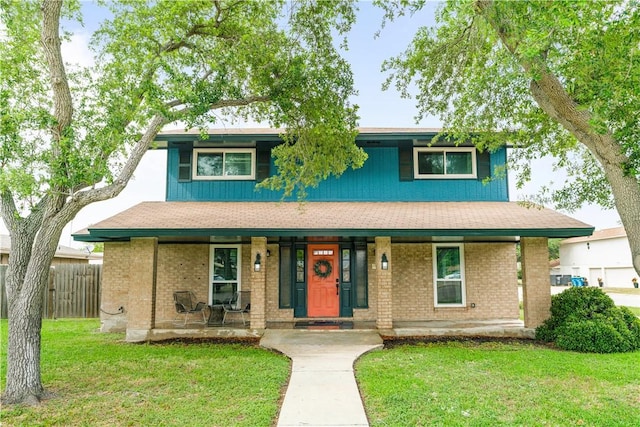 101 Llano Dr, Portland, TX 78374 - view of front of house with a porch and brick siding