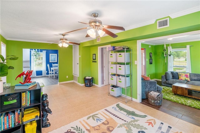 101 Llano Dr, Portland, TX 78374 - recreation room with ornamental molding, ceiling fan, and baseboards