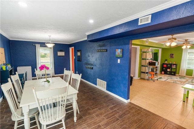 101 Llano Dr, Portland, TX 78374 - dining room featuring plenty of natural light, baseboards, crown molding, ceiling fan, and recessed lighting