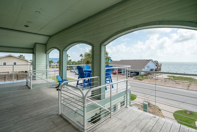 1819 Bay Shore Dr, Rockport, TX 78382 - wooden terrace featuring a water view