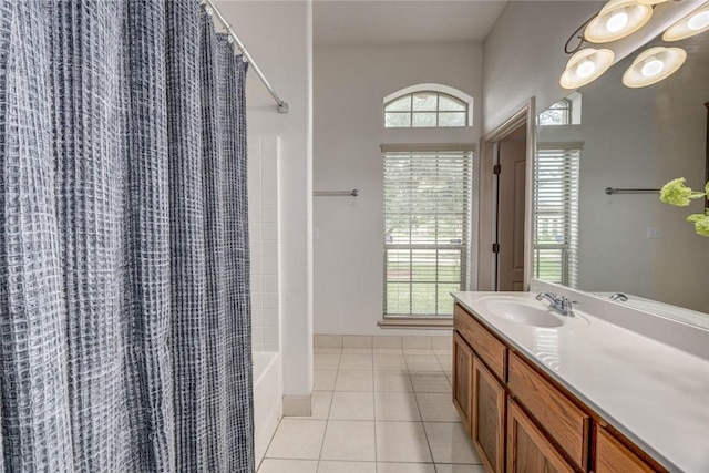 46 E Bar Le Doc Dr, Corpus Christi, TX 78414 - bathroom with tile patterned flooring, vanity, and shower / tub combo with curtain