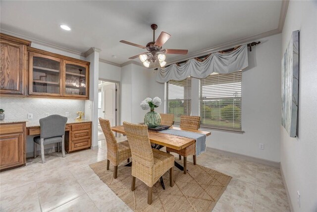 46 E Bar Le Doc Dr, Corpus Christi, TX 78414 - dining room featuring ornamental molding, ceiling fan, and baseboards