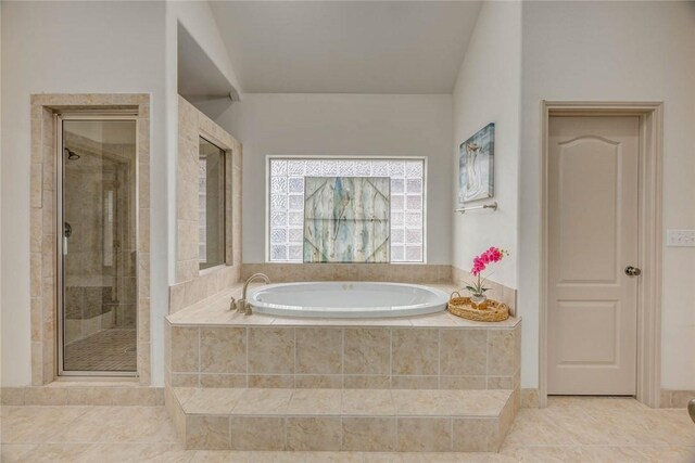 46 E Bar Le Doc Dr, Corpus Christi, TX 78414 - full bathroom featuring a shower stall, a bath, and tile patterned flooring
