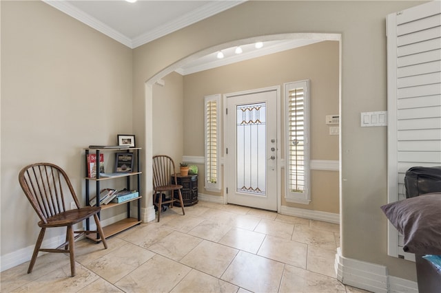 entryway featuring ornamental molding