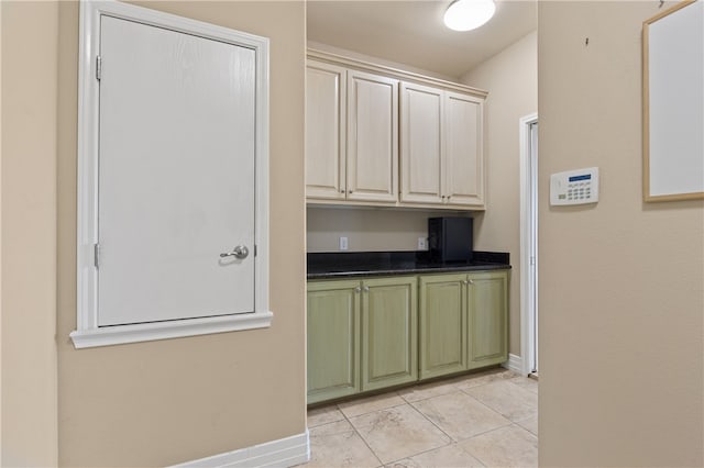 kitchen featuring light tile patterned flooring