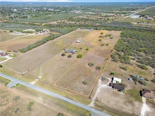 birds eye view of property featuring a rural view