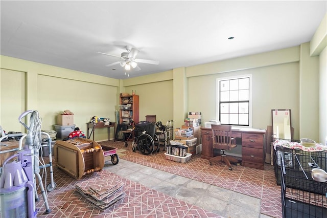 interior space with ceiling fan