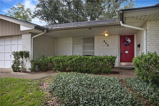 property entrance featuring a garage