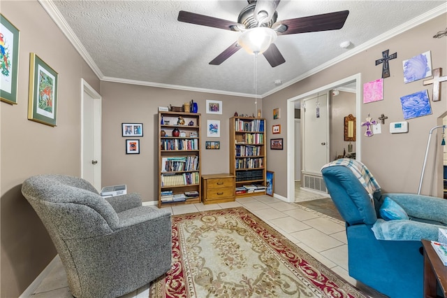 tiled office with ornamental molding, a textured ceiling, and ceiling fan