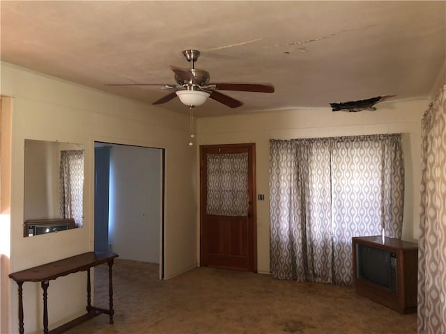 1408 S Norton Hwy, Freer, TX 78357 - carpeted entrance foyer with a ceiling fan