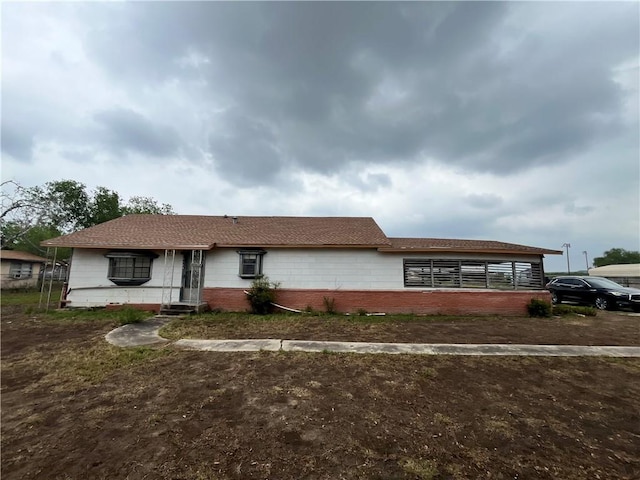 1408 S Norton Hwy, Freer, TX 78357 - ranch-style house with brick siding and entry steps